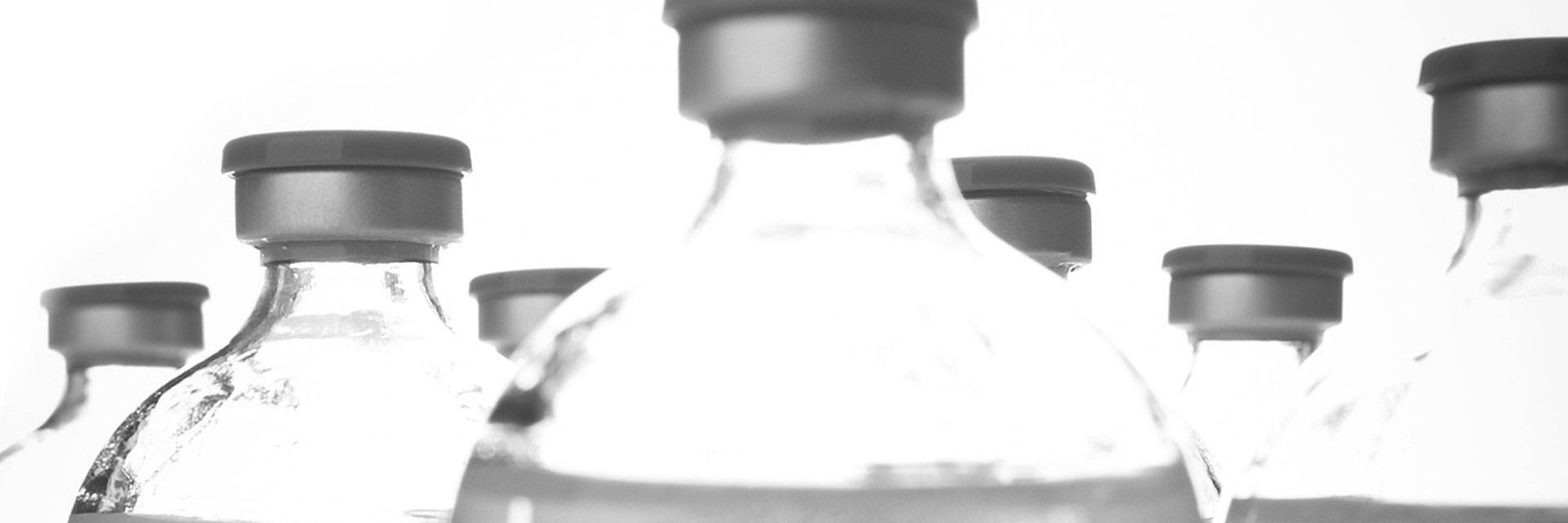 Tops of several vial containers